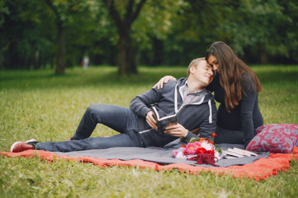 NYC Park Couple Under Blanket: A Romantic Escape in the City